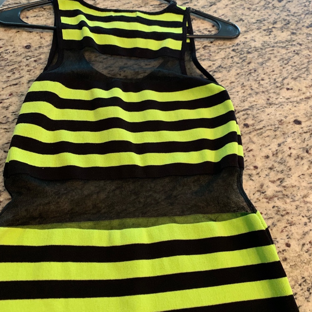 Neon green and black dress.